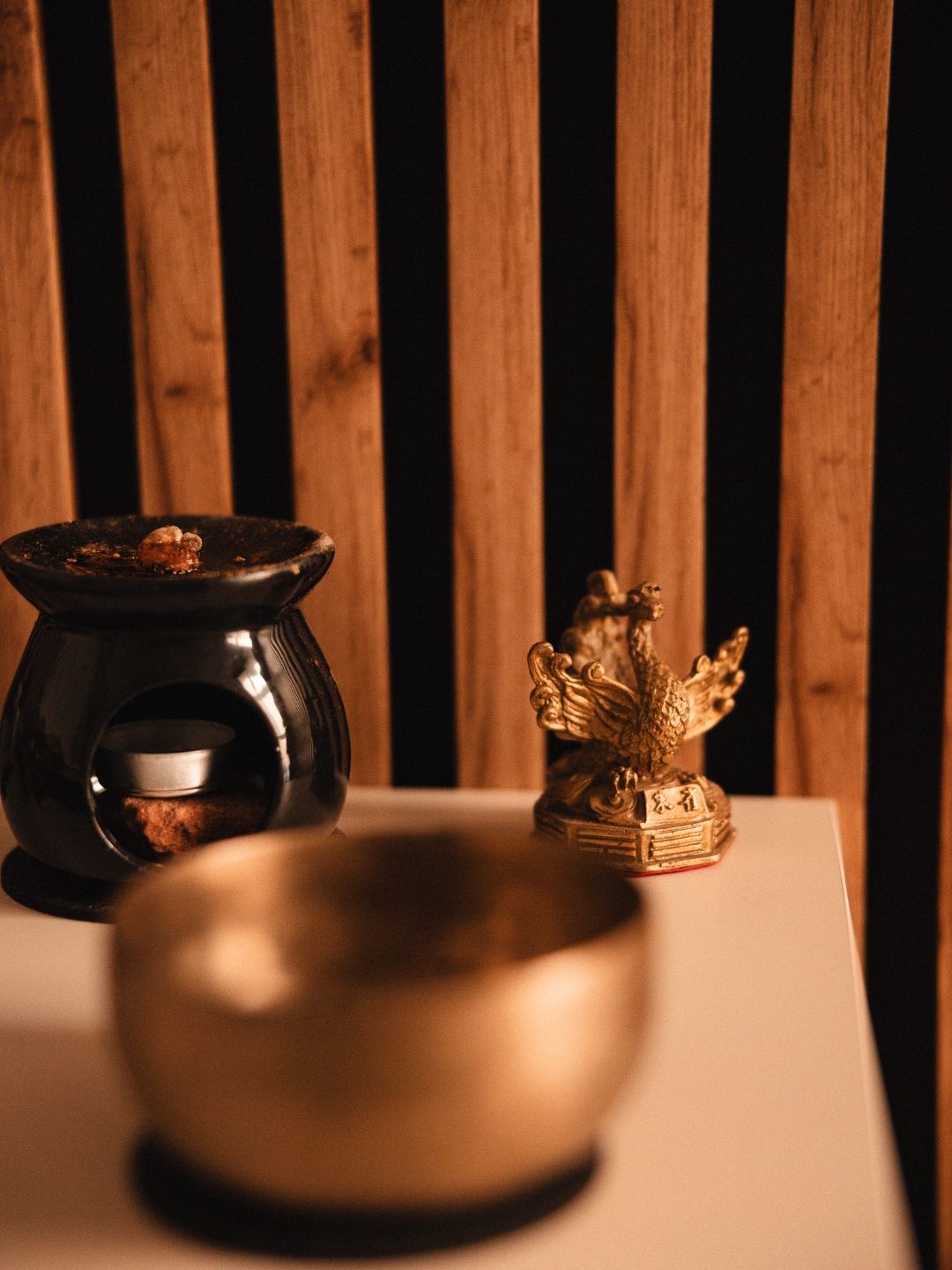 Matthew Brincat walking along the shoreline at sunset